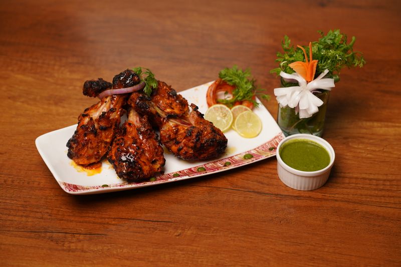 Spicy buffalo wings with blue cheese dip — a Wing Snob classic